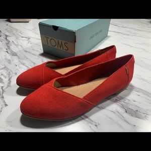 Tom’s Julie flats. Never worn, with original box.